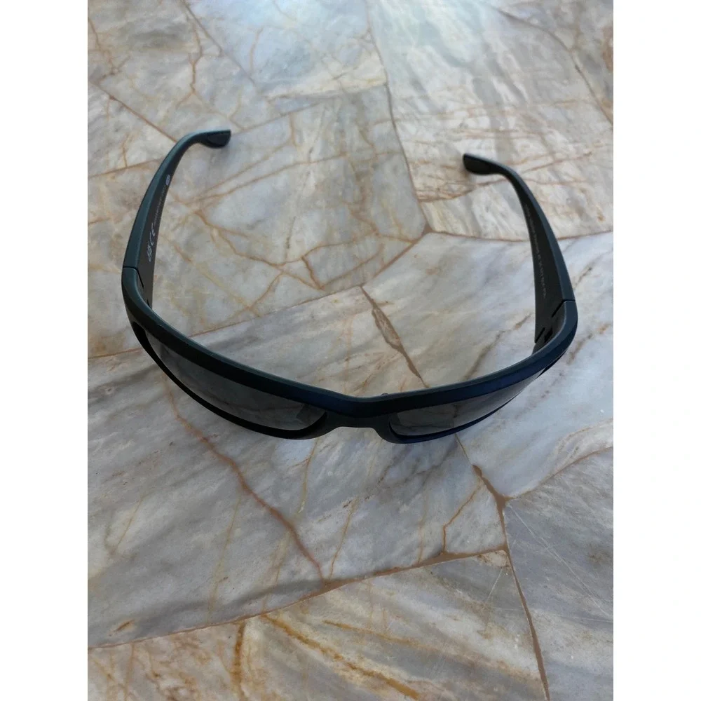 Foster Grant NS0324 Polarized Wrap Sunglasses Matte Black AT 24 572 BLK POL